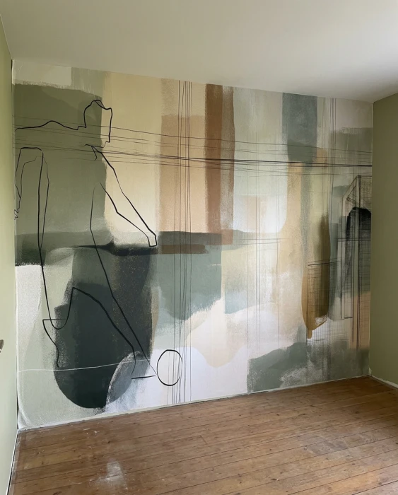 Tapete FORMA mit Fußballspieler, Ball und Tor auf einer Wand über einem Holzboden